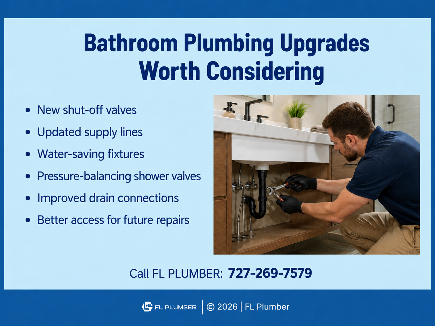 A plumber installs or adjusts under-sink plumbing beneath a modern bathroom vanity using hand tools.